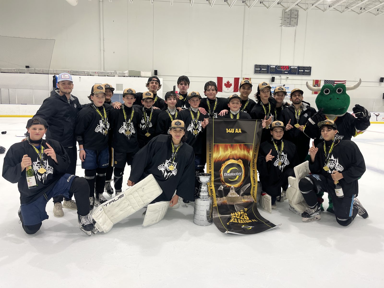 OneHockey champions with the trophy and mascot