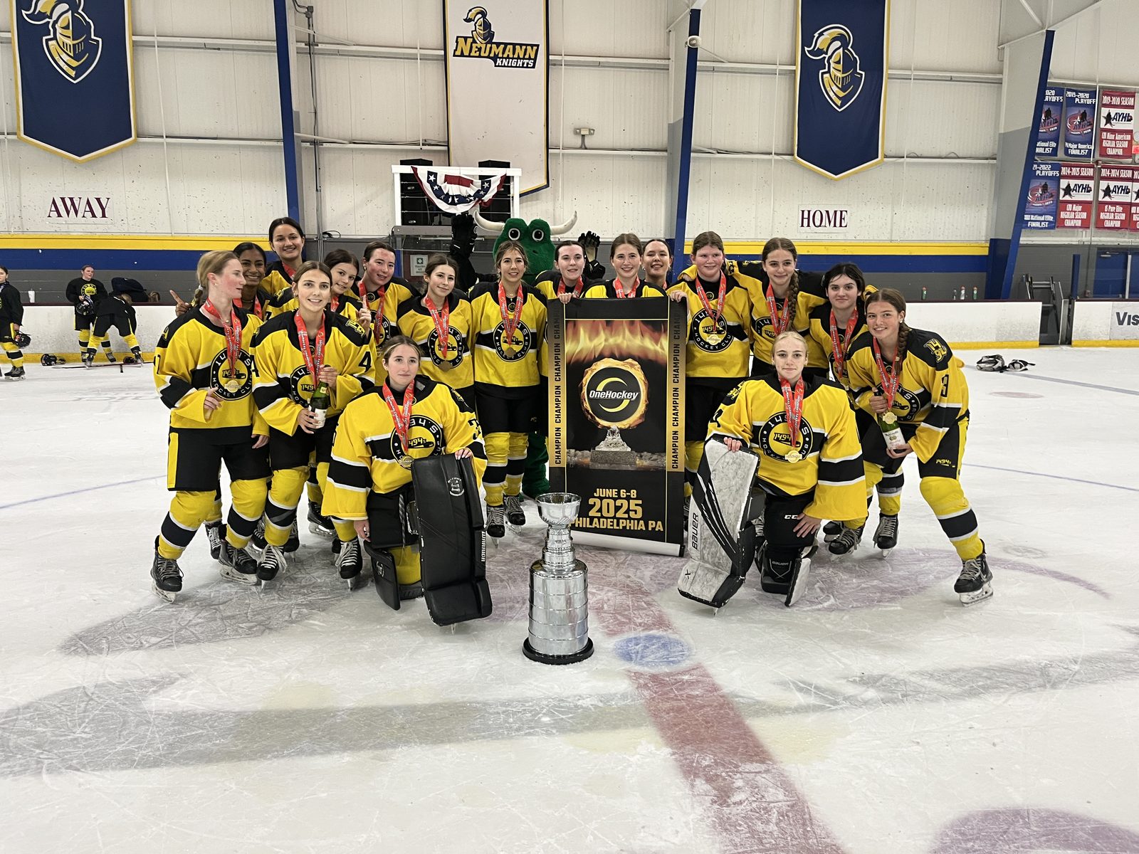 OneHockey champions with the trophy on the ice